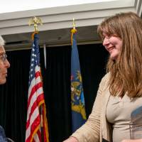 Betty Niemeyer shaking hand